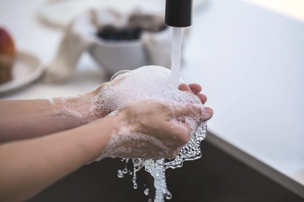 hand washing to prevent spread of diseases